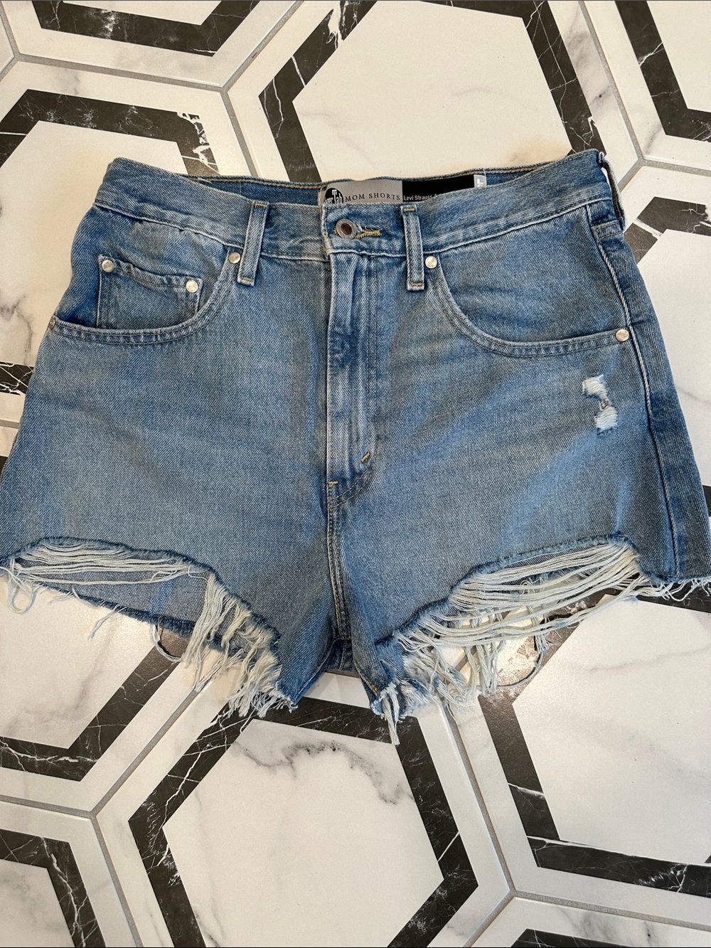 Levi's Women’s Distressed Light Blue Denim Shorts